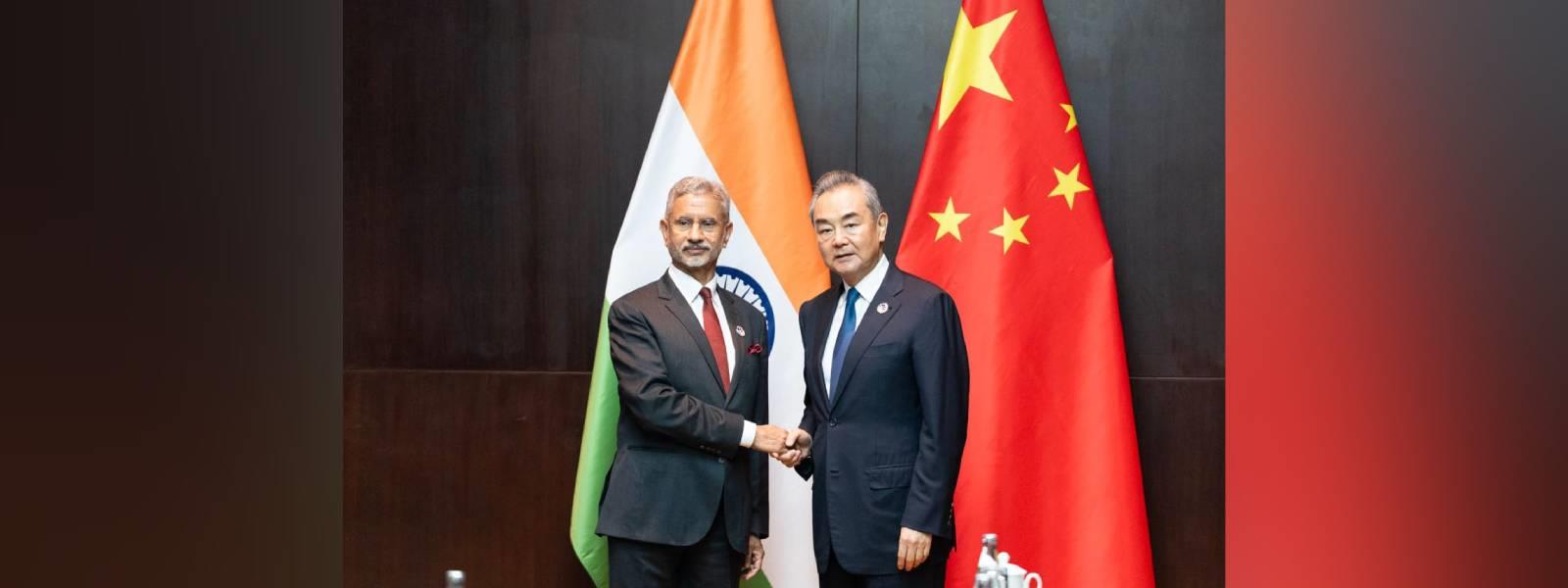 External Affairs Minister, Dr. S. Jaishankar met H.E. Mr. Wang Yi, Member of the Communist Party of China (CPC) Politburo and Foreign Minister of China on the sidelines of ASEAN meetings in Vientiane